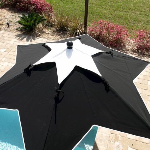 Vista superior de una sombrilla Creta en forma de estrella con tela Sunbrella