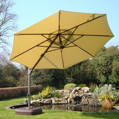 Sombrilla de poste lateral o cantiliever redonda modelo Bosca con tela Sunbrella
